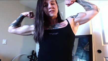 Most muscle girl flexes lean body