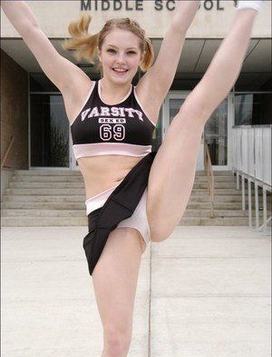 Cheerleader shows huge labia